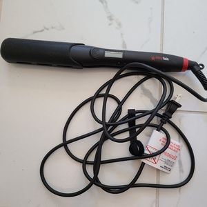 SEXY HAIR flat iron. Only used once.